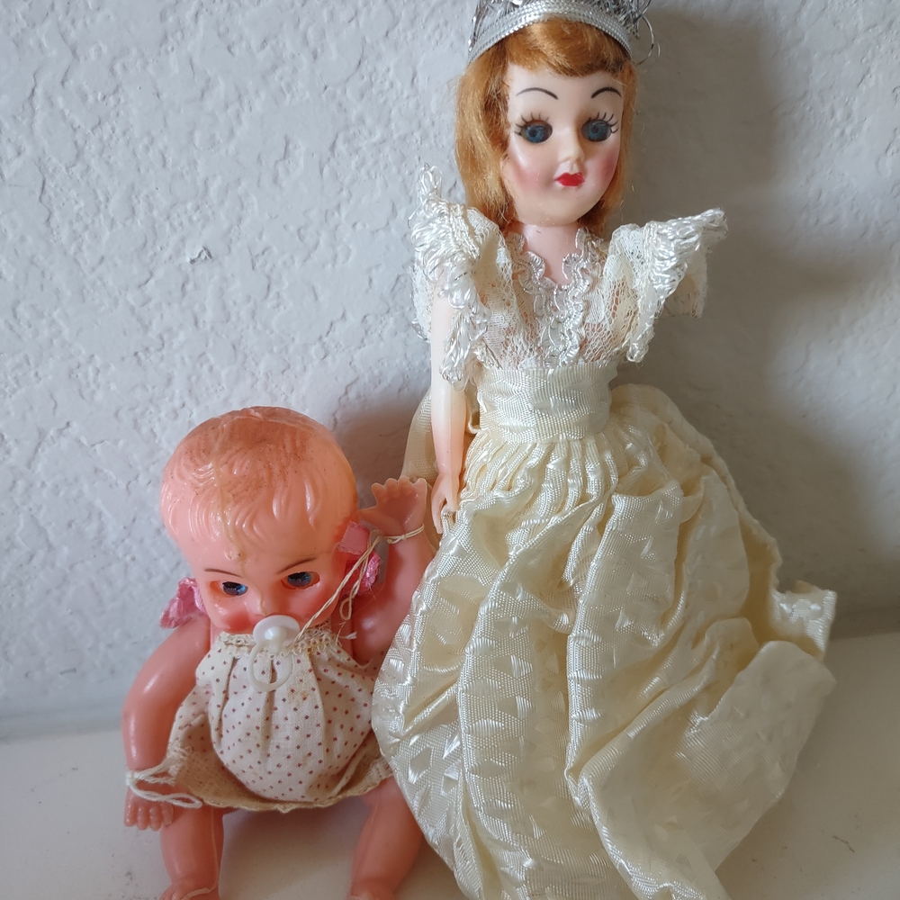 Vintage Small Dolls 1960s Hong Kong Baby & PrincessThe baby's head as a hole
